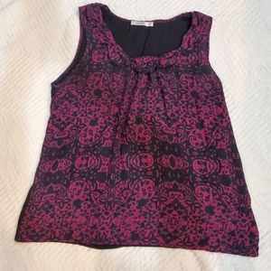 Ricki's purple blouse